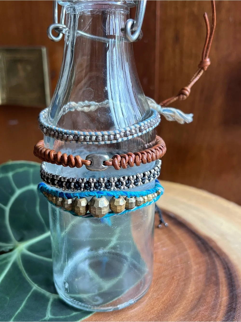 Set of Four. Stackable Beaded and Cord Bracelets - Blue, Brown, Silver, Gold